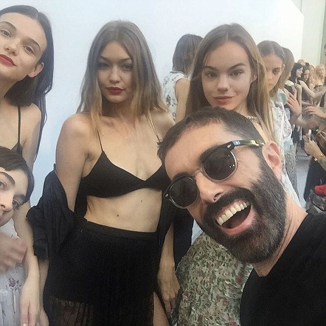 Behind the velvet ropes: Giambattista Valli's snaps selfie with Gigi Hadid and Sara Sampiao.